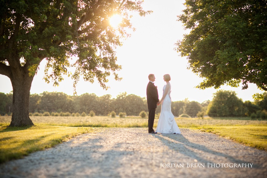 Guests watch the outdoor ceremony at Valenzano Winery, photograph 22