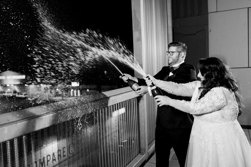 FAME MaKen Studios Philadelphia wedding reception bride and groom champagne