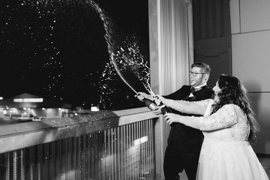 FAME MaKen Studios Philadelphia wedding reception bride and groom champagne