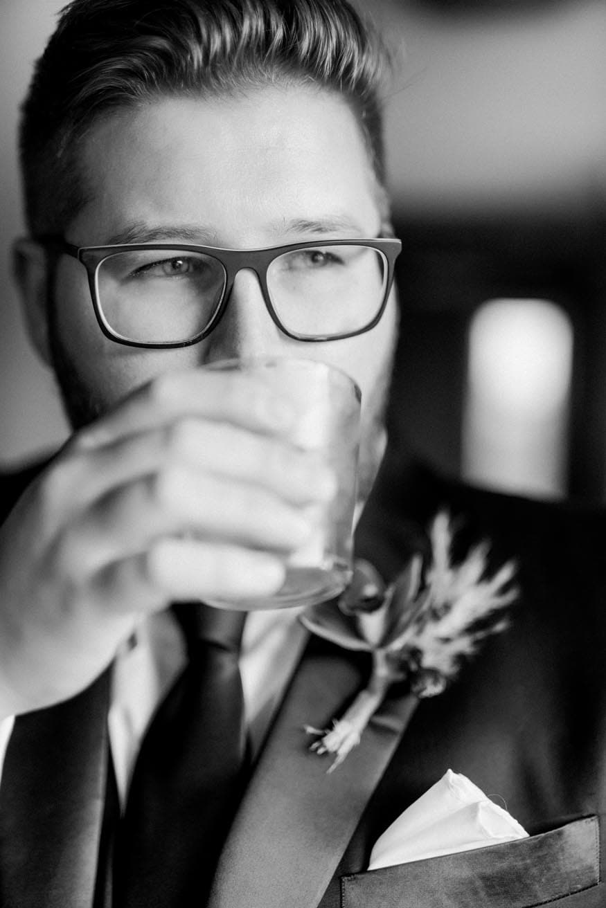 Philadelphia wedding groom portrait at bar
