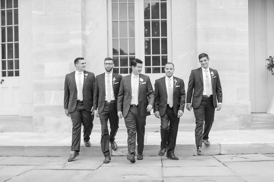 Philadelphia wedding groomsmen walking