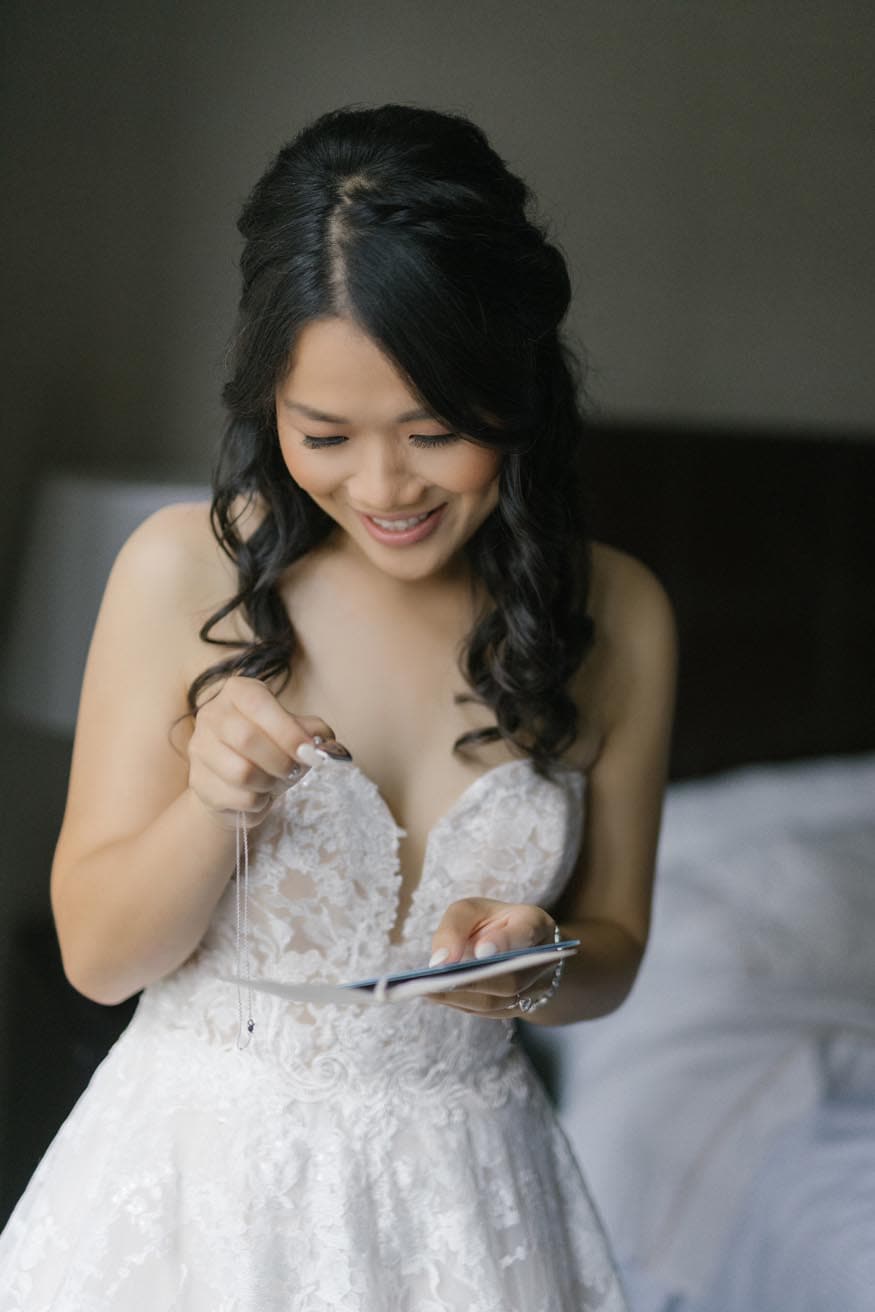 Westin Philadelphia Wedding bride opening a present