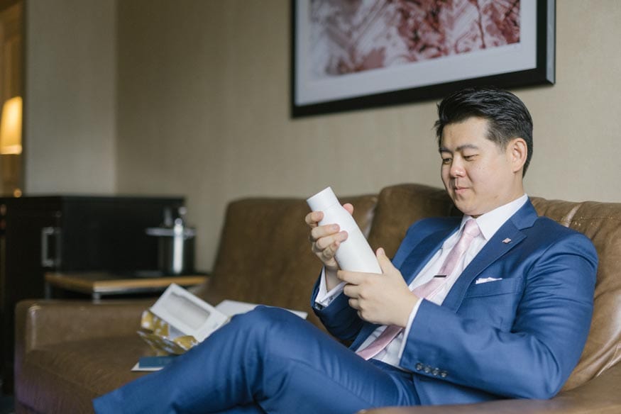 Westin Philadelphia Wedding groom opening present
