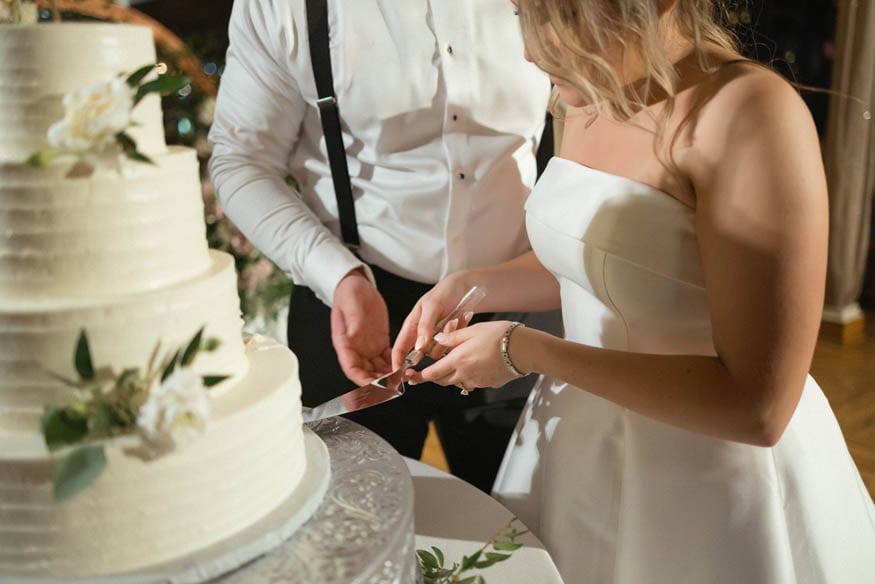 Cake cutting detail Lambertville Inn wedding reception