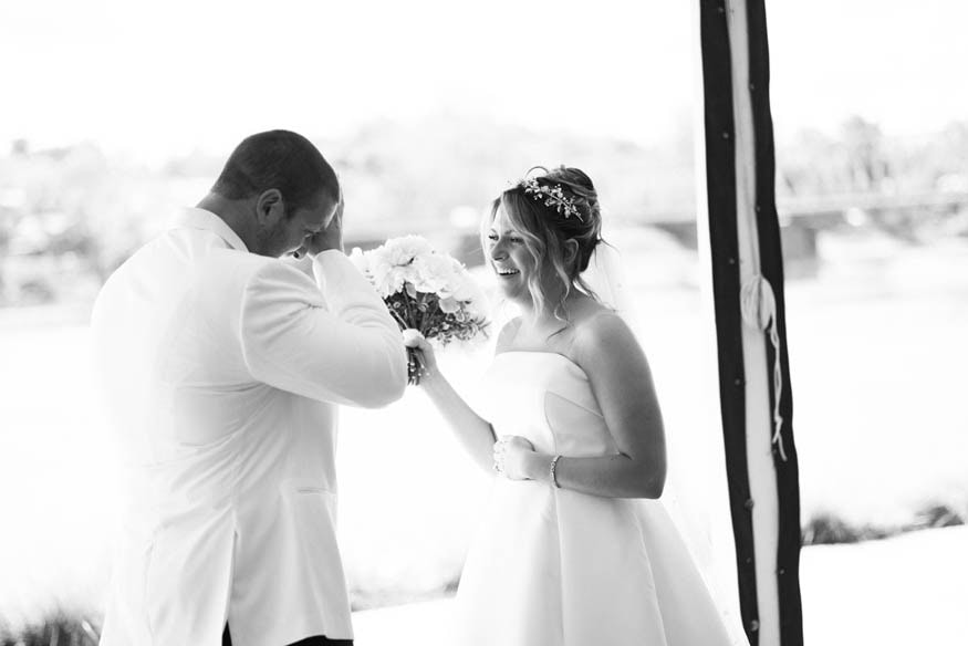 Couple laughing during first look Lambertville Inn