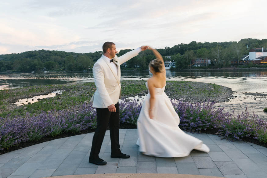 Bride and groom twirl sunset Lambertville Inn wedding