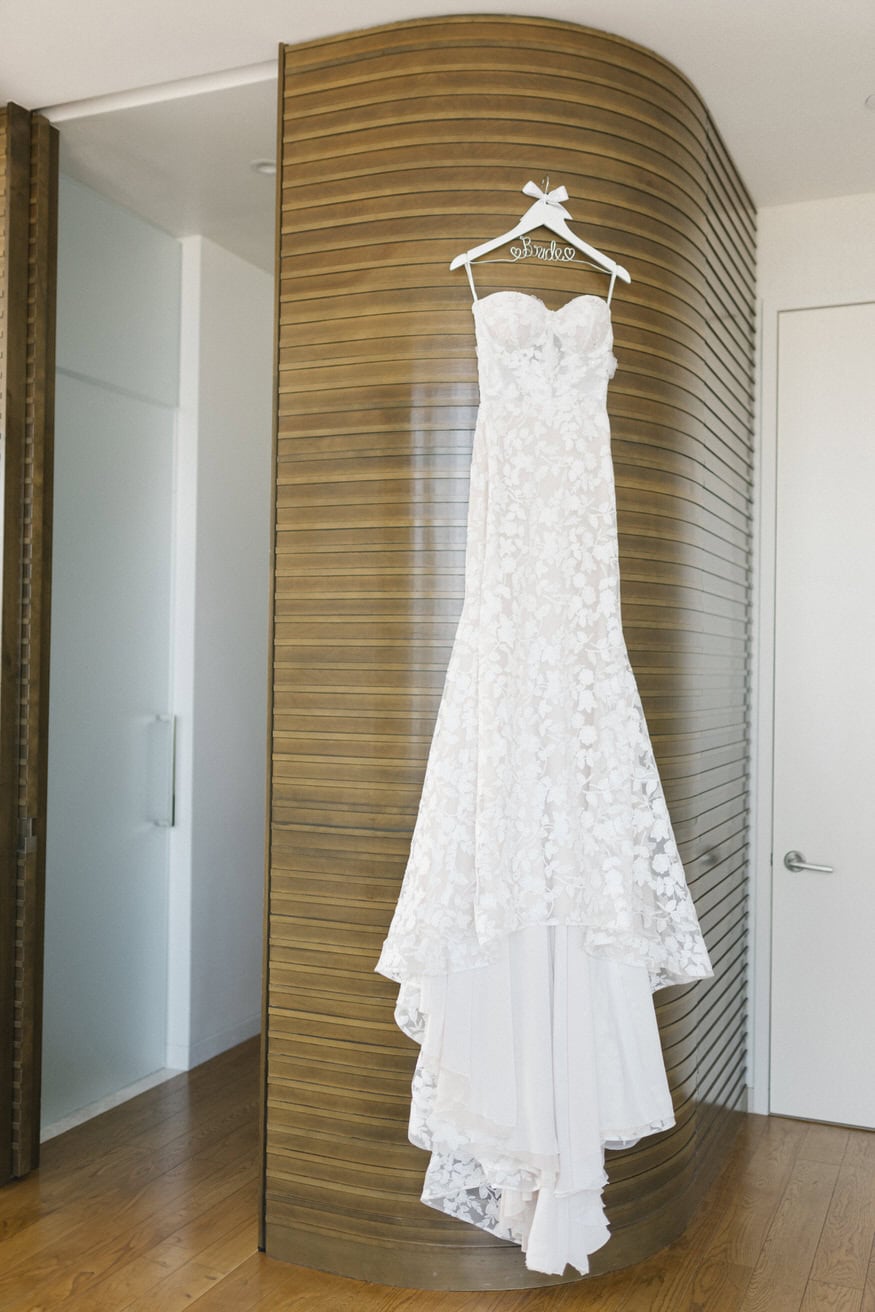 Bride putting on wedding dress Four Seasons Philadelphia