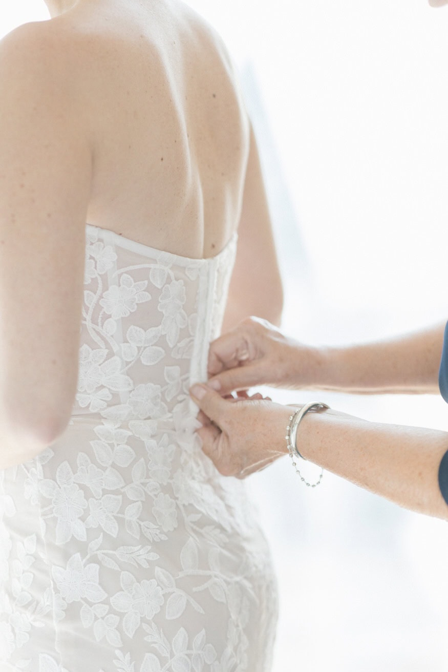 Bridesmaids helping bride get ready Four Seasons Philadelphia