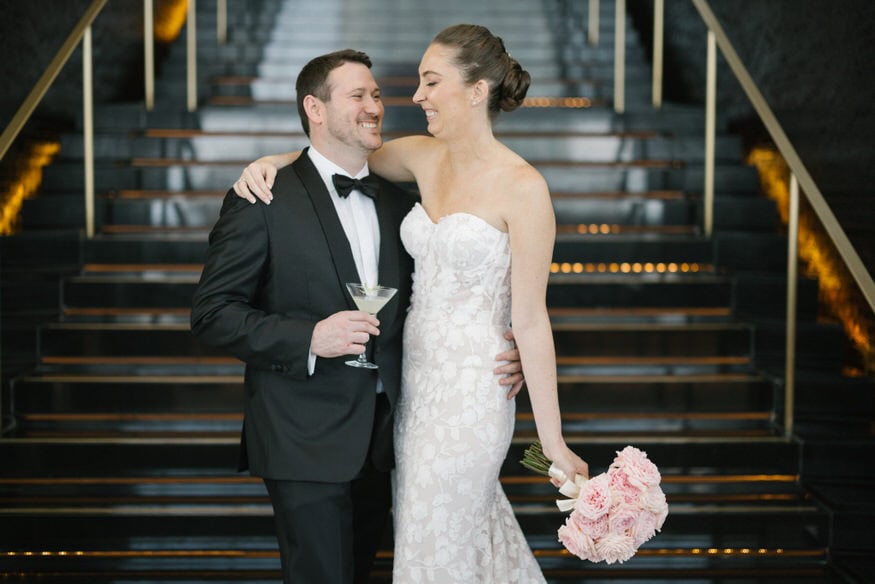Couple portrait at Four Seasons Sky Lounge with city views