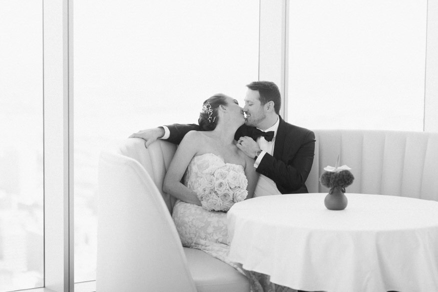 Sara and Anthony kiss during first look Four Seasons Philadelphia