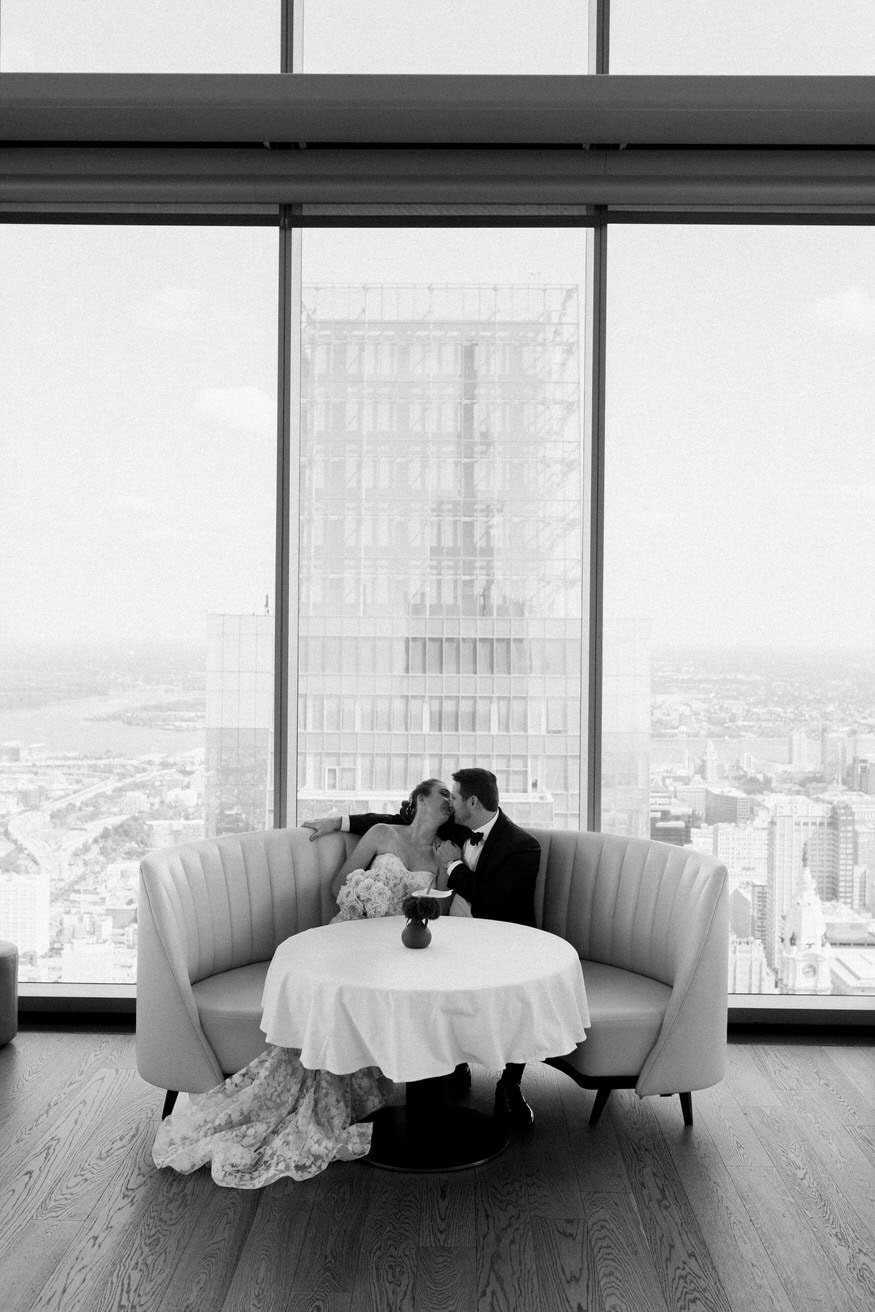 Romantic first look kiss Four Seasons Sky Lounge Philadelphia