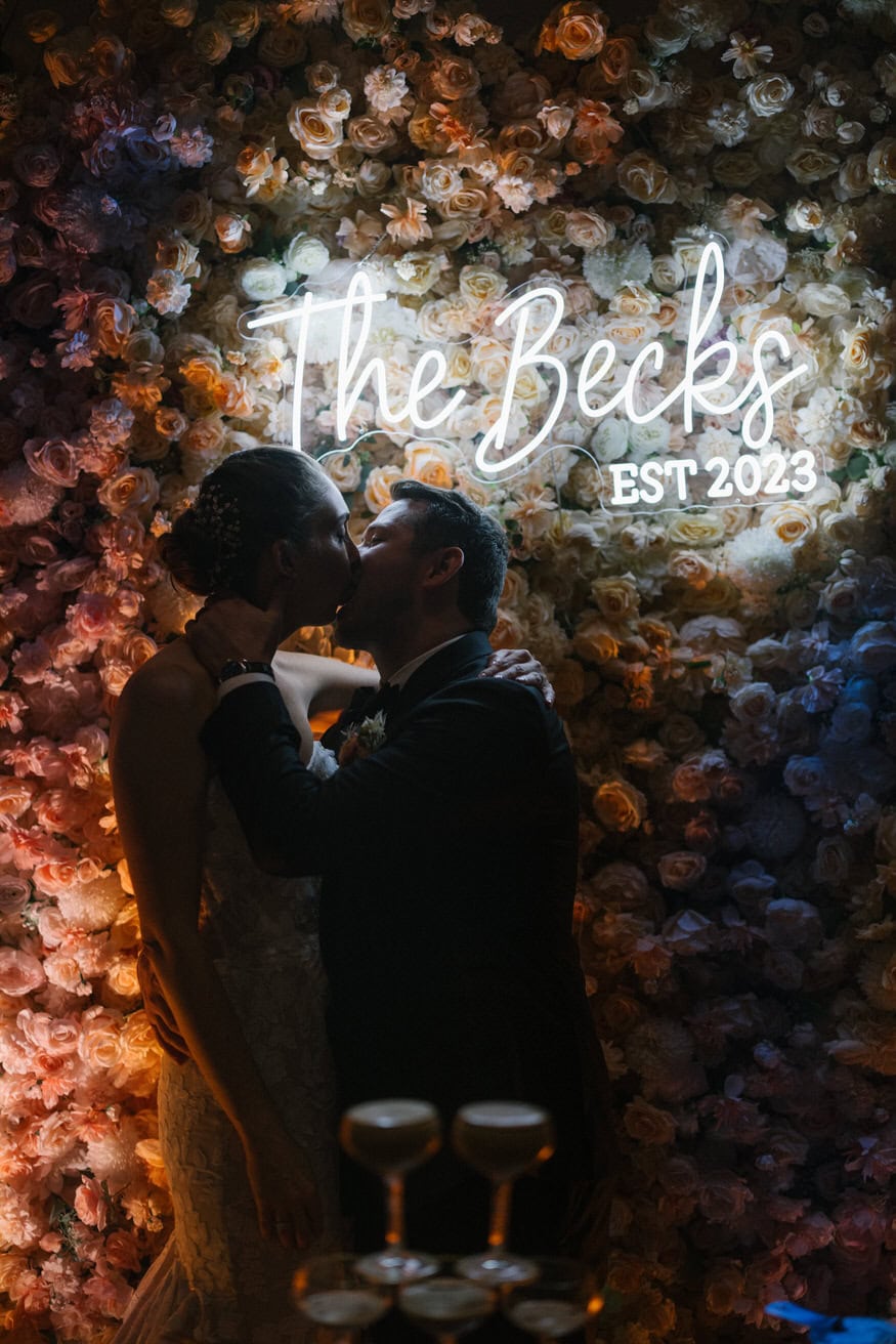 Couple kiss portrait Four Seasons Philadelphia wedding reception