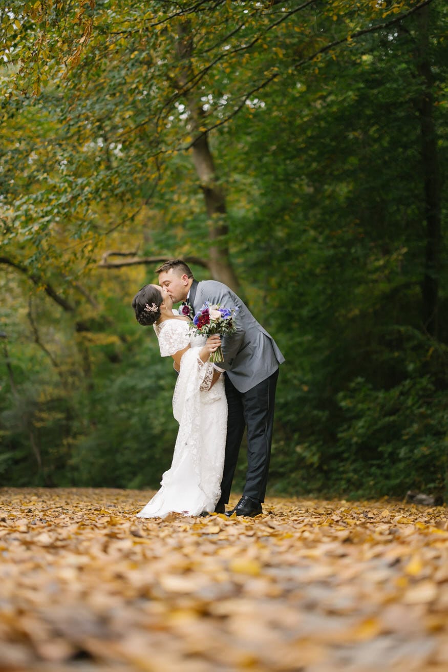 Couple kiss nature portrait Valley Green Inn Wissahickon