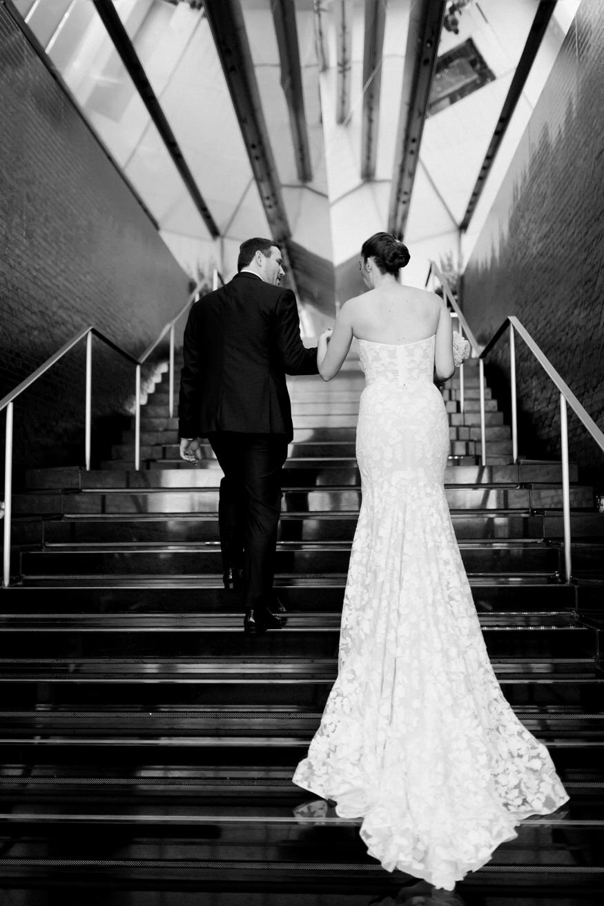 Sara and Anthony walking through Four Seasons Philadelphia lobby