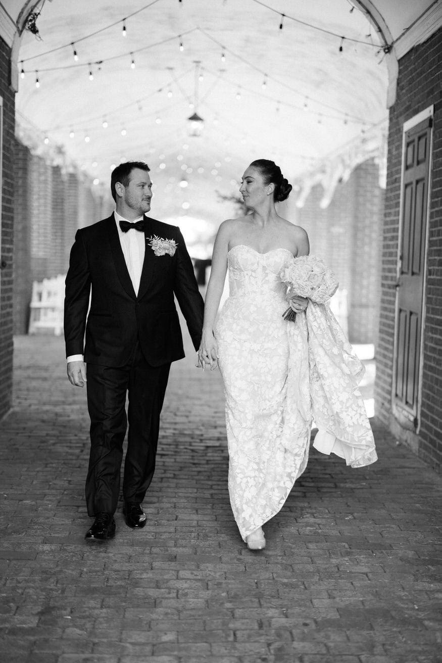 Bride and groom strolling Philadelphia streets wedding