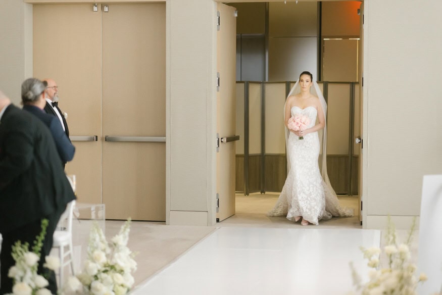 Bride walking down aisle Four Seasons Philadelphia ceremony