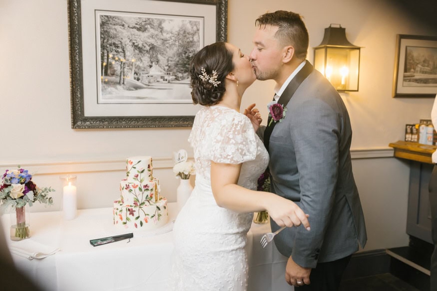 Cake cutting kiss Valley Green Inn fall wedding