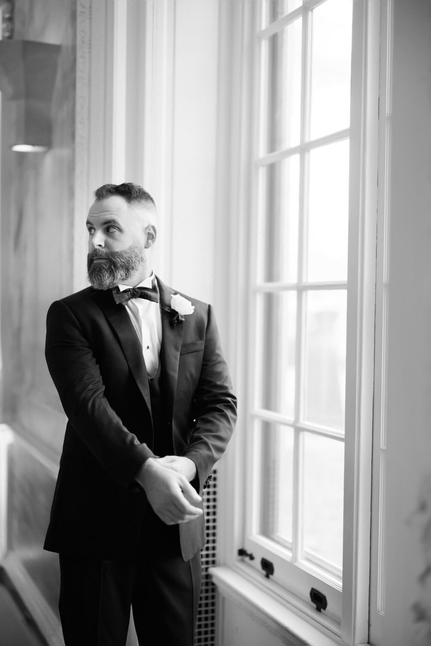Groomsmen laughing during wedding prep Curtis Arboretum