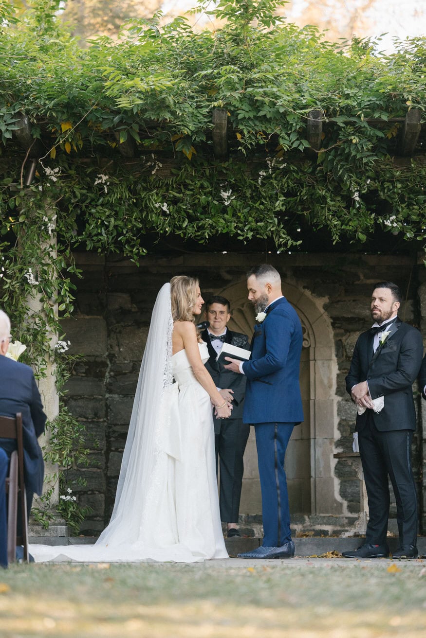 Wedding vows close-up at Curtis Arboretum outdoor ceremony