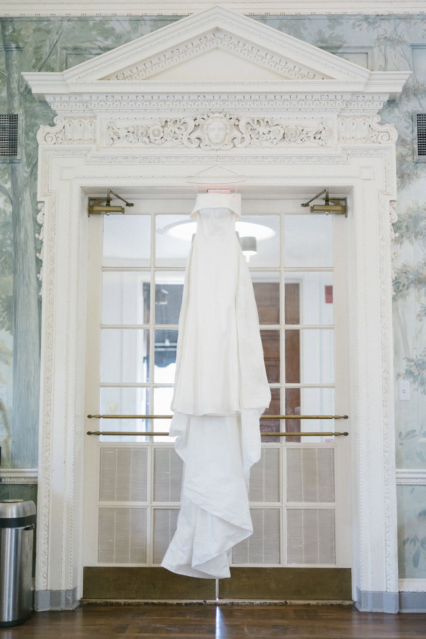 Bride wedding dress hanging at Curtis Arboretum Wyncote PA
