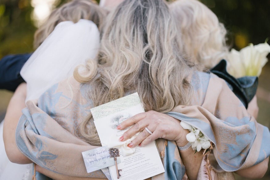 Wedding party group hug at Curtis Arboretum Wyncote PA