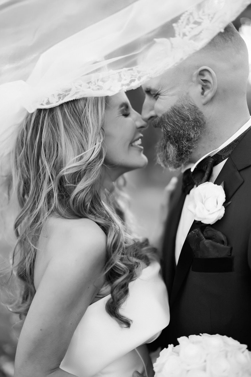 Bride and groom laughing portrait Curtis Arboretum Wyncote
