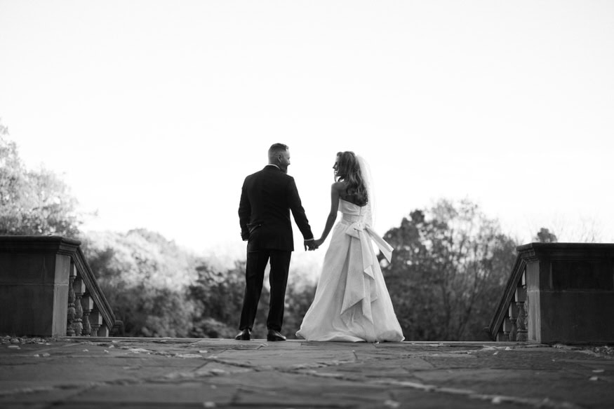 Couple walking together Curtis Arboretum wedding portraits