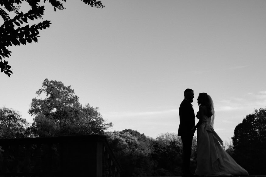 Bride and groom kiss portrait Curtis Arboretum fall wedding