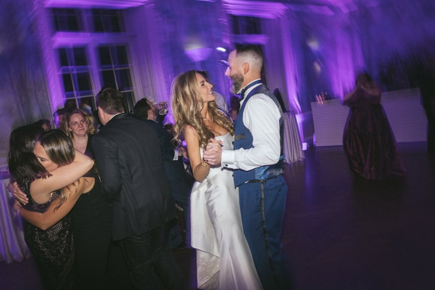 Bride and groom dancing under stars Curtis Arboretum