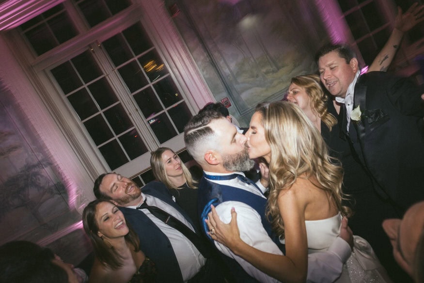 Final kiss nighttime portrait Curtis Arboretum fall wedding