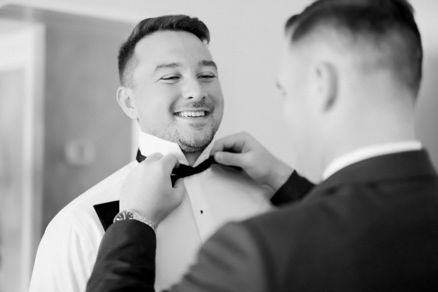 Groom getting dressed Chestnut Hill Hotel Philadelphia