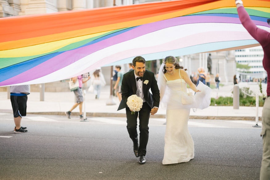 Wedding couple celebrating at City Hall Philadelphia