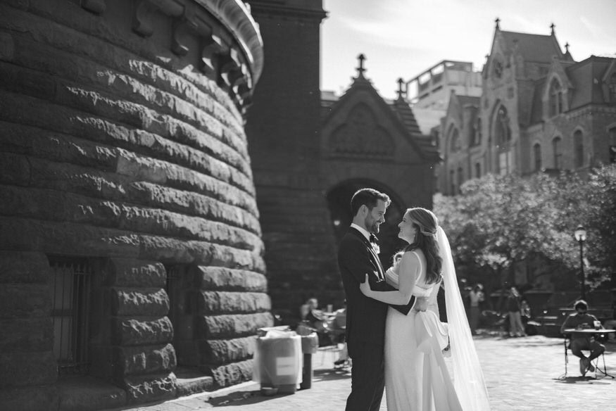 Couple walking UPenn campus wedding photos Philadelphia