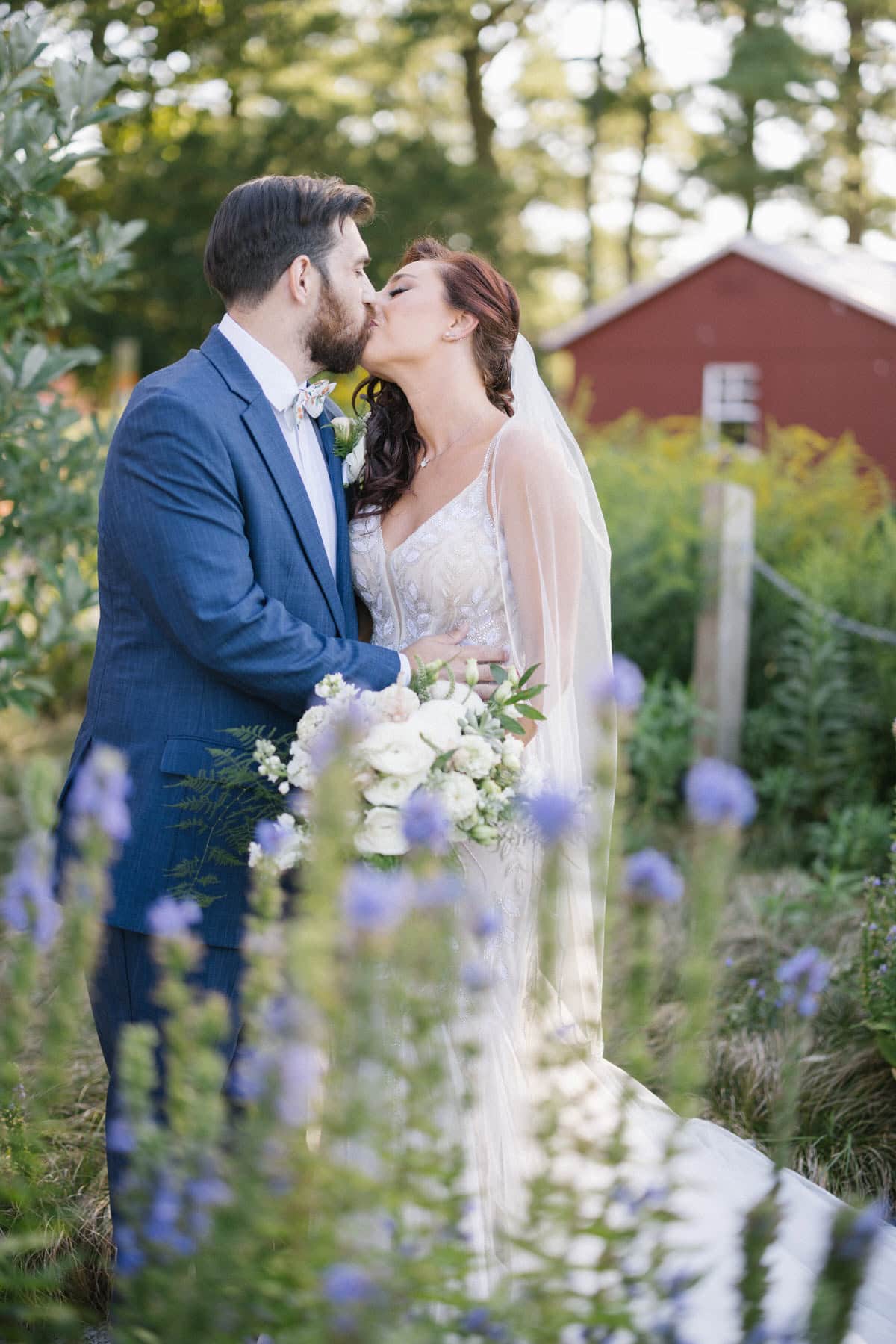 Bishop Farmstead Wedding couple portrait with flowers
