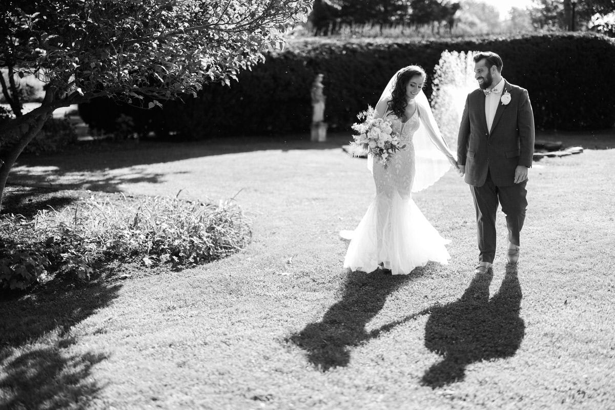 Bishop Farmstead Wedding couple portrait next to fountain