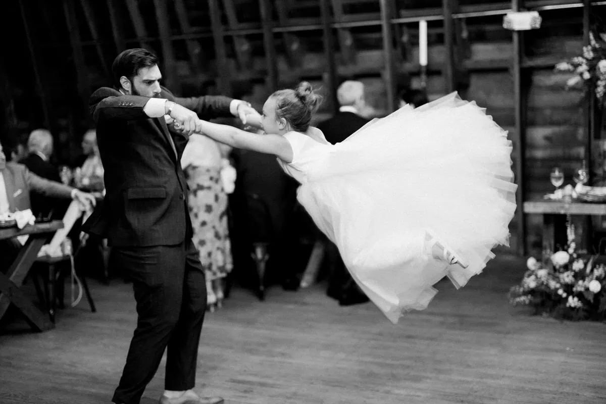 groom dancing with flower girl Bishop Farmstead Wedding reception Southampton, NJ