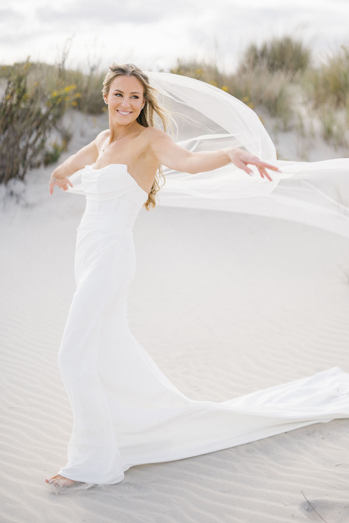 Summer beach couple portraits at ICONA Avalon with ocean light in Avalon NJ