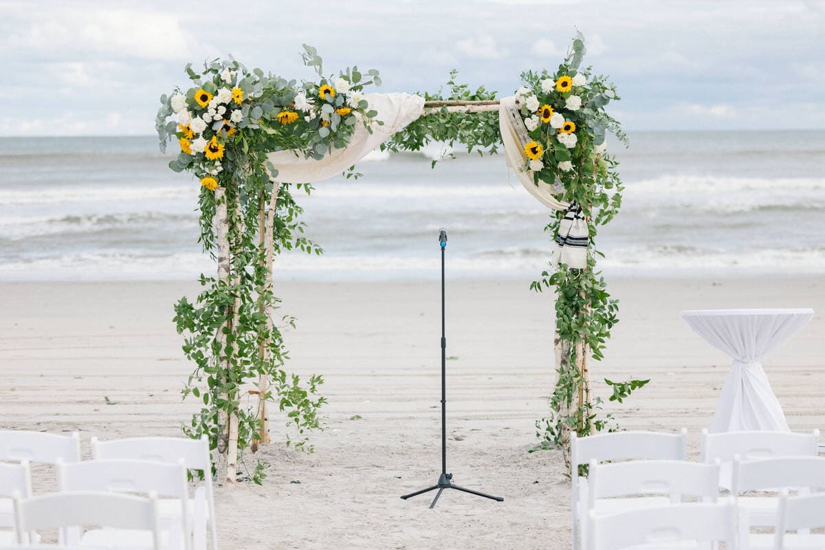 Guests at a beachfront ceremony at ICONA Avalon, Avalon NJ