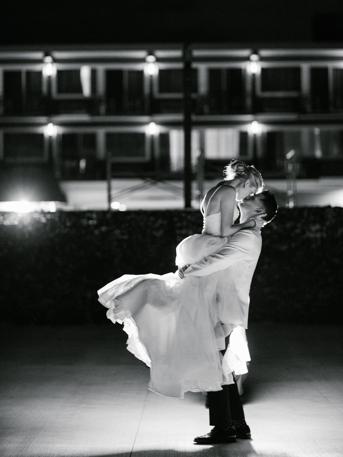 Romantic night portrait of bride and groom at ICONA Avalon beach club in Avalon NJ