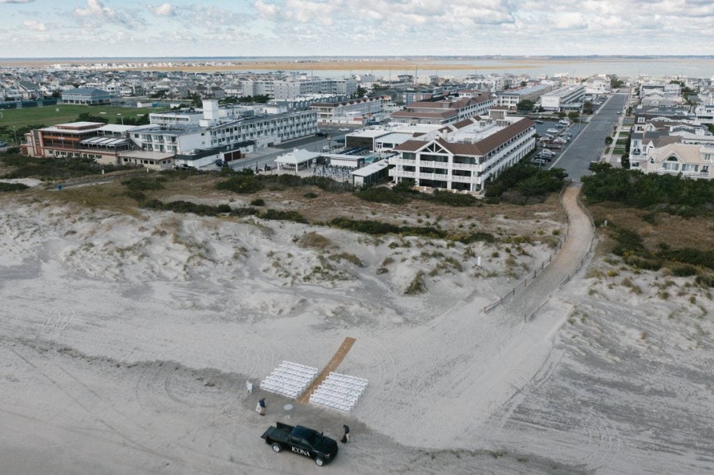 Aerial drone view of the ICONA Avalon resort and Avalon barrier island, showing beach and bay, Avalon NJ