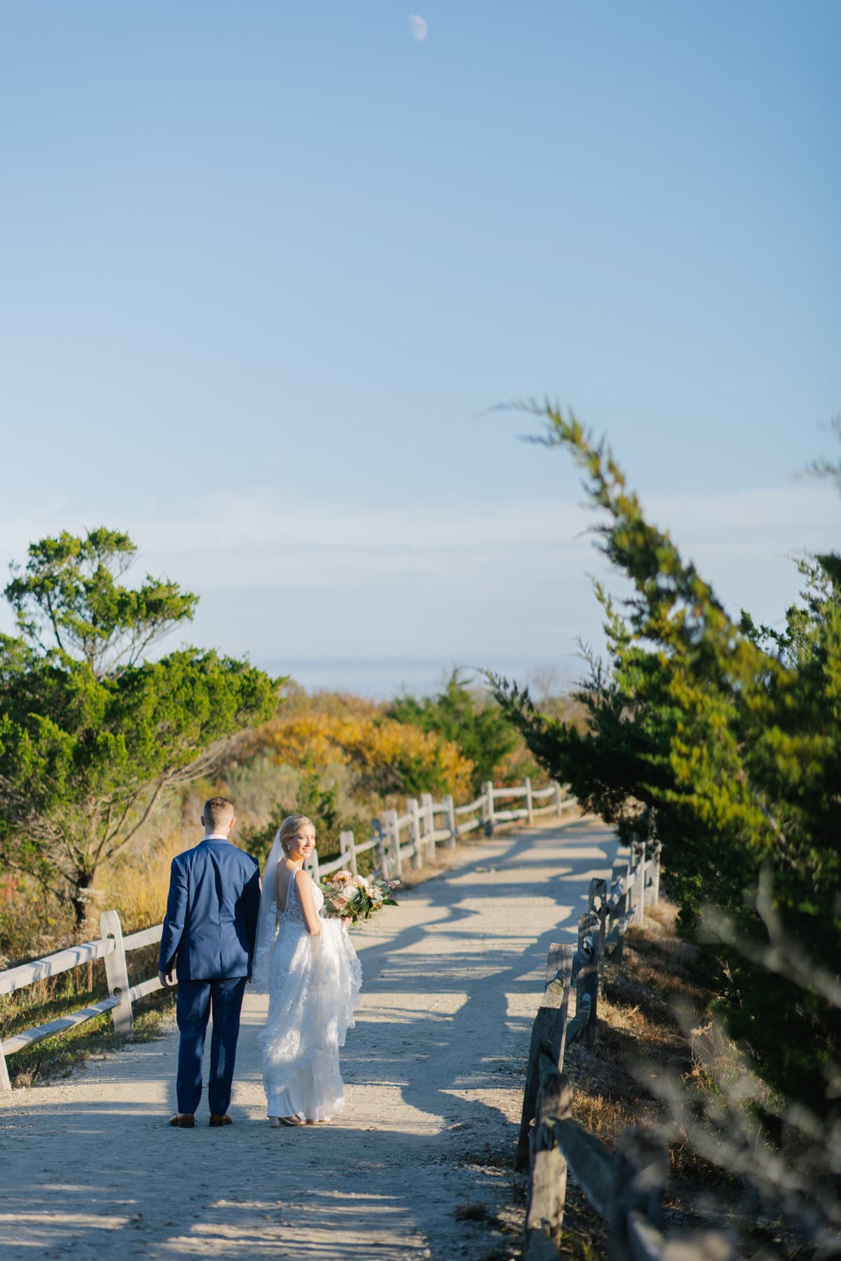 Couple fall portraits with autumn color near ICONA Avalon in Avalon NJ
