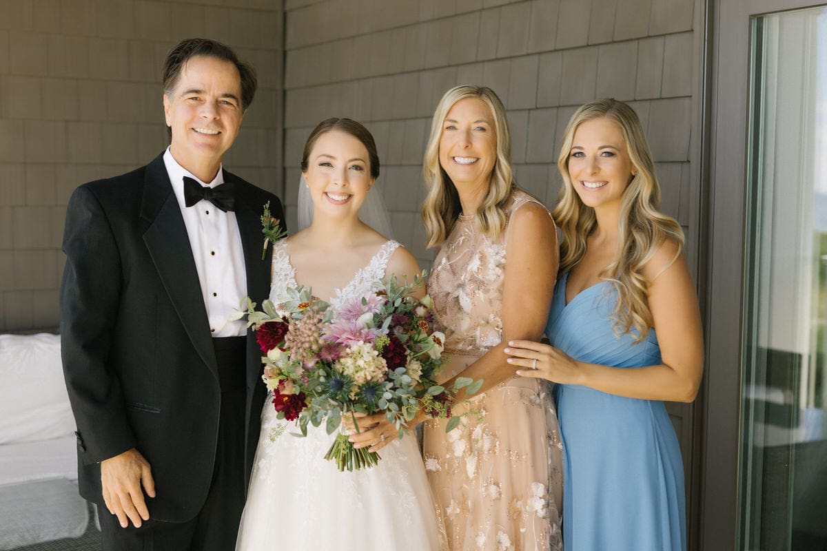 Family portrait on the room suite deck balcony at ICONA Avalon in Avalon NJ