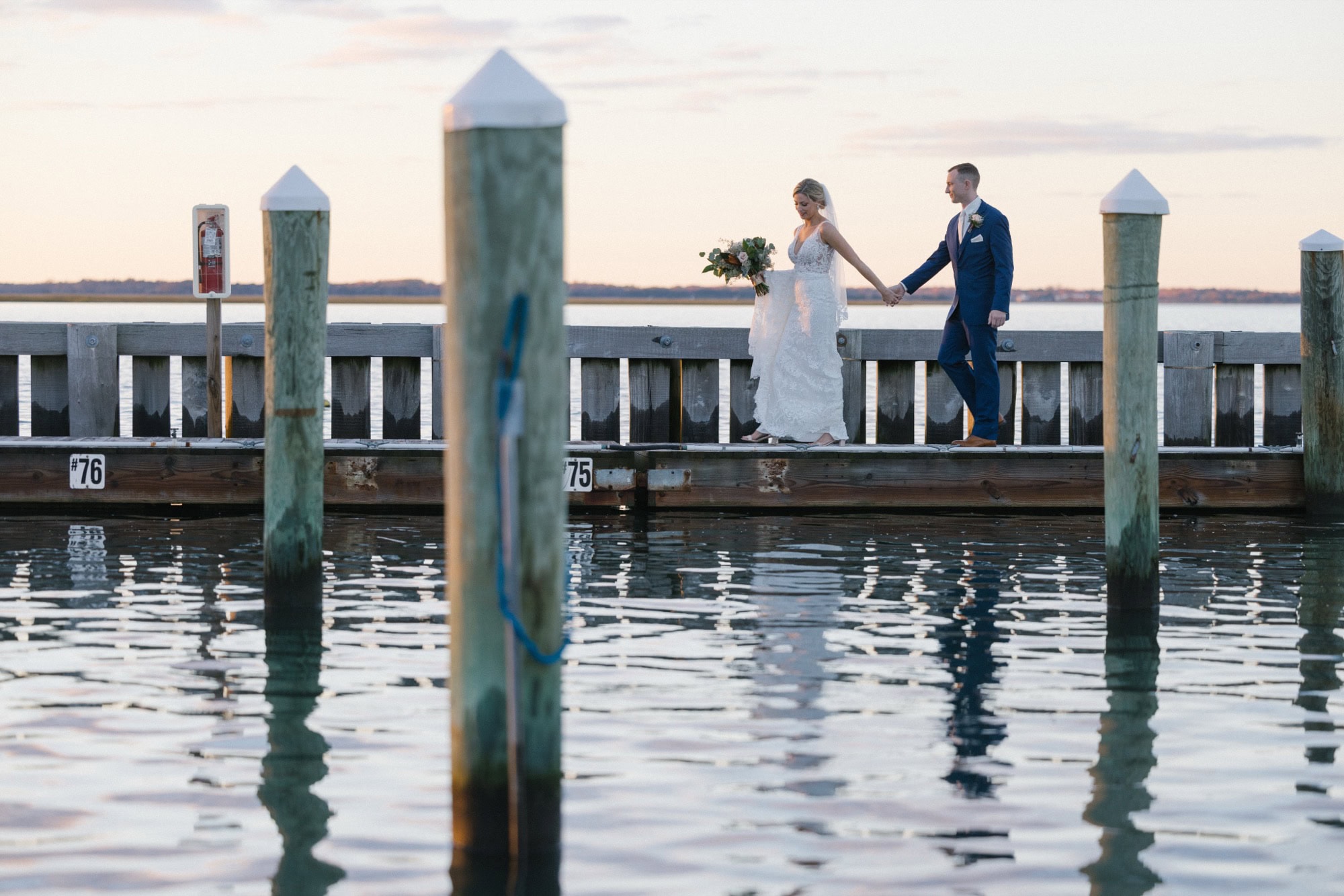 Bay sunset portraits on the marina dock at ICONA Avalon in Avalon NJ