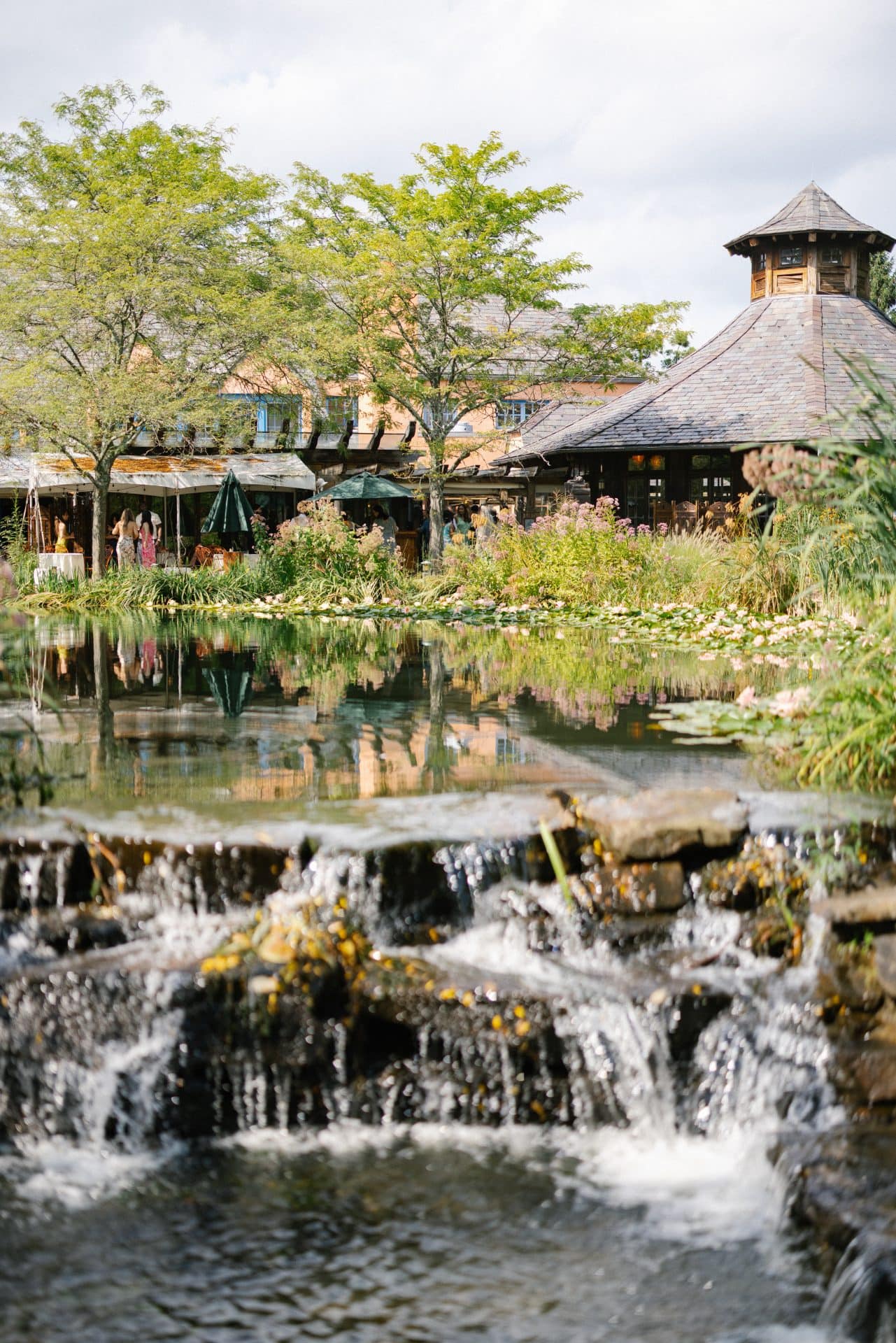 Rat's Restaurant waterfall with lily pads at Grounds for Sculpture wedding venue in Hamilton NJ