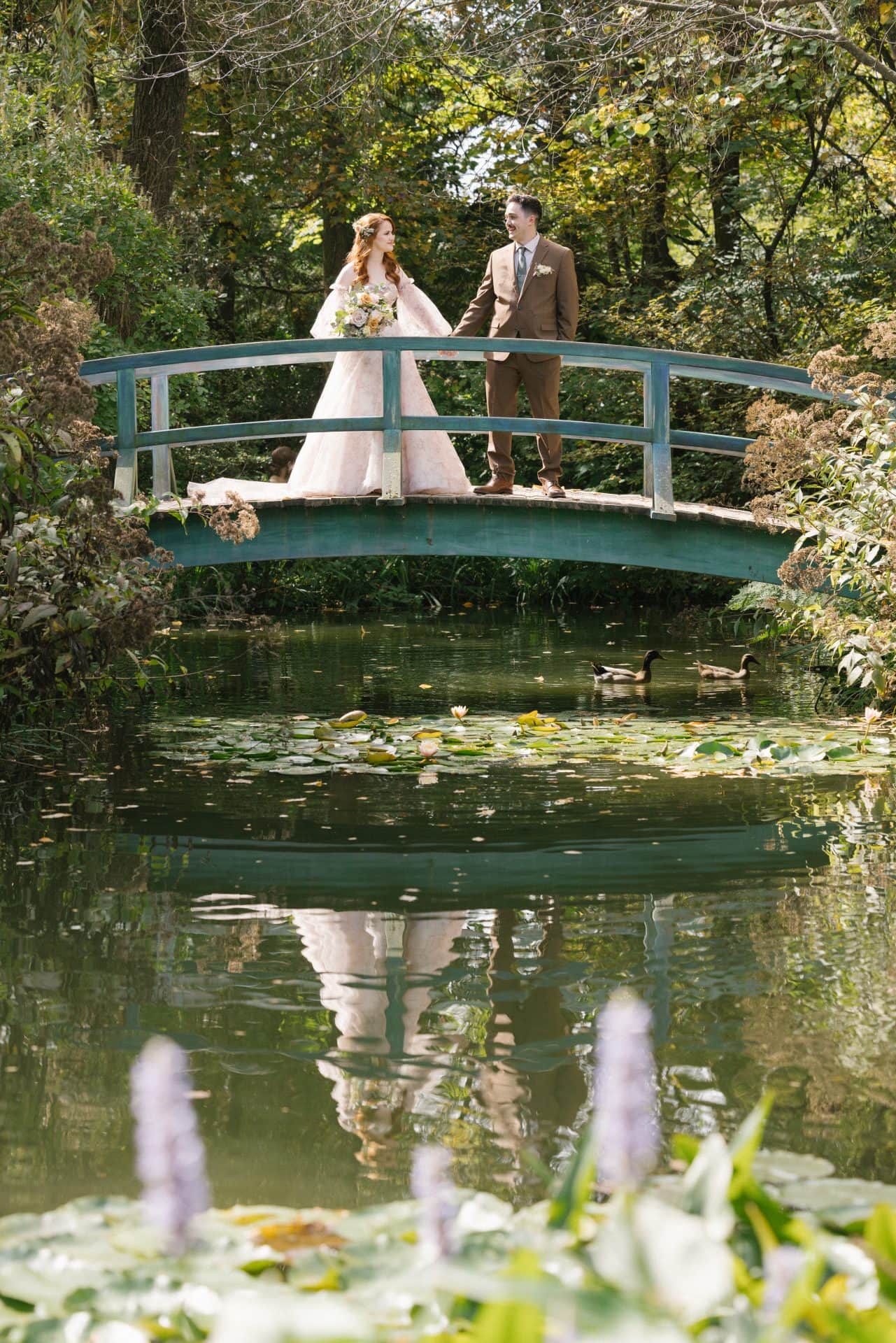Wedding couple portrait on the Monet Bridge at Grounds for Sculpture, Hamilton NJ