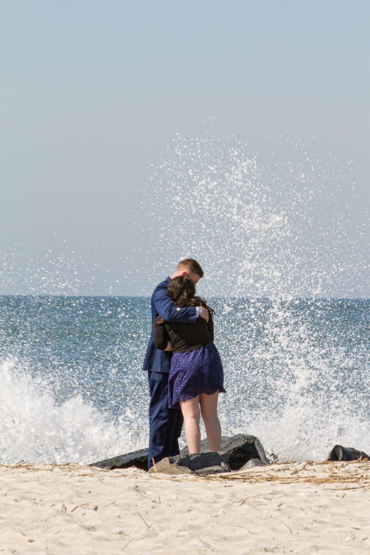 Wes and Sarah celebrating their engagement on the Cape May jetty
