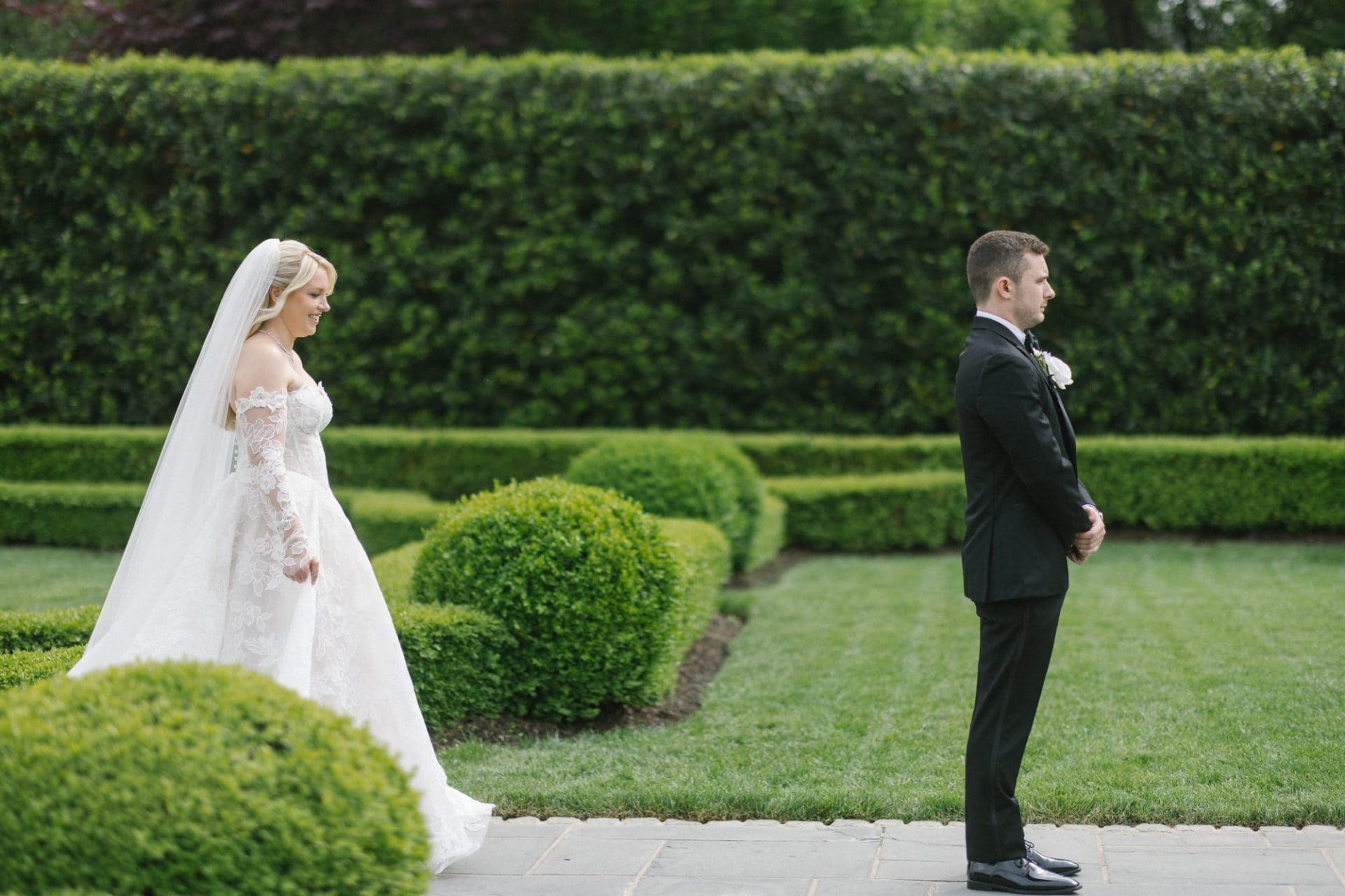Janelle and Jim's first look in the Park Chateau gardens