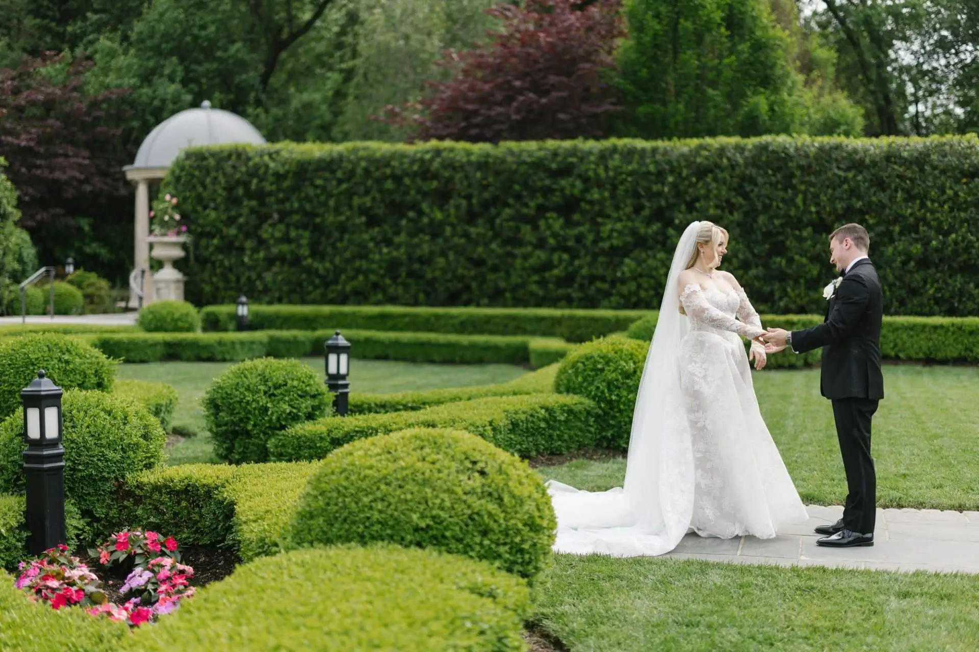 Janelle and Jim's first look in the Park Chateau gardens