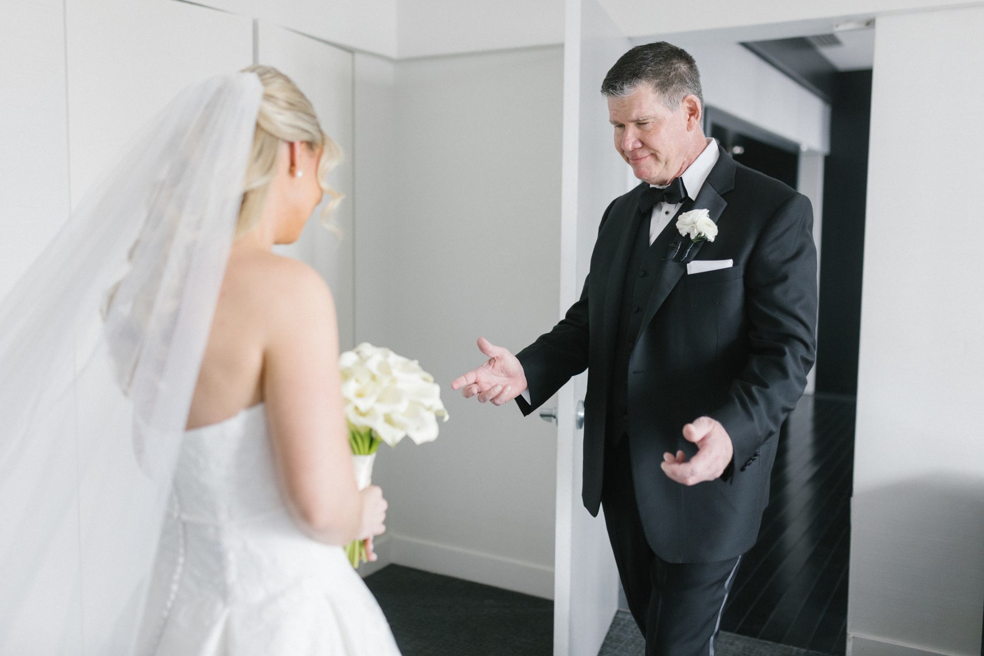 Father of the bride first look emotional reaction seeing daughter in wedding dress