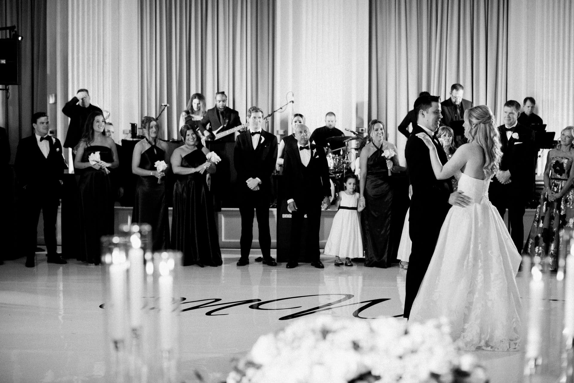 First dance on custom monogrammed dance floor at Ballroom at the Ben wedding